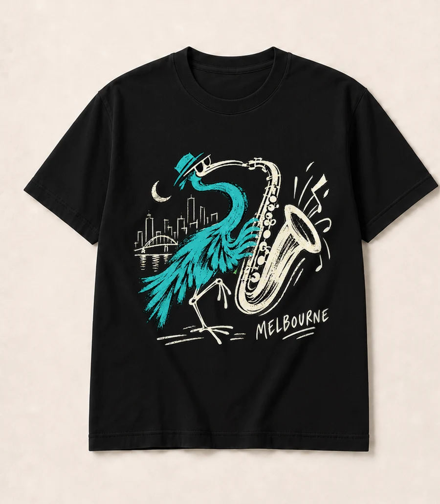 Night Bird: a turquoise bird playing saxophone above Melbourne lettering on a black T-shirt